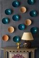 Close-up of Algonquin vinyl wallpaper by Canadian designer Scott Yetman, inspired by the Indigenous Algonquin people and influenced by Agnes Martin’s minimalist style. The wallpaper features a small-scale ticking stripe pattern with rich texture, providing a sophisticated and classic backdrop. Photographed by Tom Mannion.